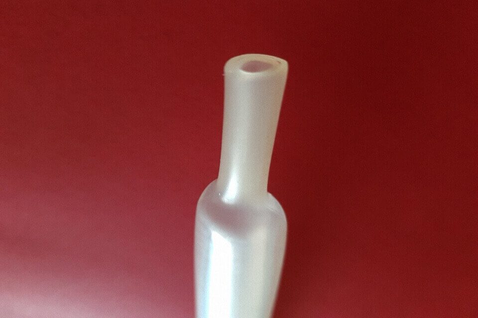 Funda retráctil transparente con pegamento interno